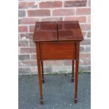 A SMALL EDWARDIAN MAHOGANY INLAID WORK TABLE, the twin lift-up lid opening to a material lined