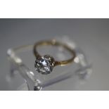 AN 18CT GOLD DIAMOND SOLITAIRE RING, the old cut diamond being of an estimated 0.75 carat, in an