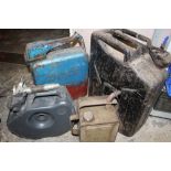 A 1952 MILITARY JERRY CAN, together with a Kraftstoff Mercedes petrol can, Eversure filling can