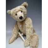 A LARGE STEIFF LIMITED EDITION 'TEDDY BEAR 1909 BLOND 65' REPLICA MOHAIR BEAR, number 1200 of
