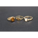 A HALLMARKED 9 CARAT GOLD TIGERS EYE RING, ring size L together with a 9 carat 'heart' ring and an