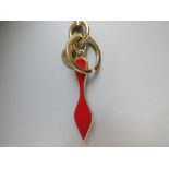 A CHRISTIAN LOUBOUTIN ENAMEL AND GOLDTONE METAL BAG CHARM / KEYRING, approx overall L 16 cm