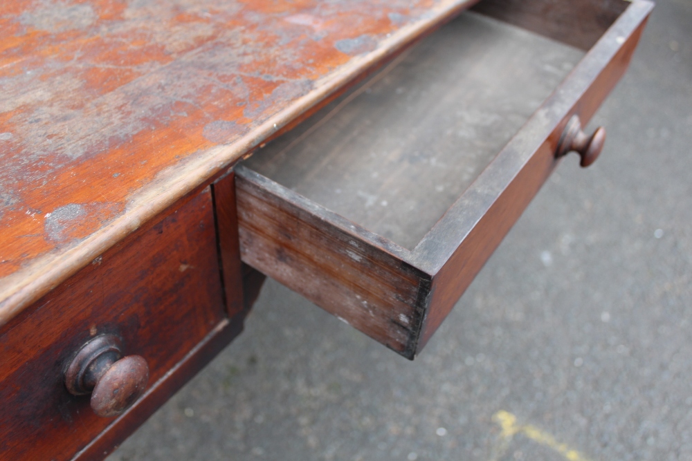 A 19TH CENTURY MAHOGANY TRAY TOP WASHSTAND, having three frieze drawers, raised on turned - Image 7 of 7