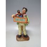 A ROYAL DOULTON ORGAN GRINDER FIGURE- HN2173, printed marks to base, H 22 cm