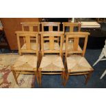 A SET OF SIX VINTAGE CHURCH WICKER SEAT CONGREGATION CHAIRS - EACH WITH FOLDOUT KNEELING PAD TO