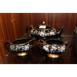 A VICTORIAN STYLE THREE PIECE CERAMIC TEA SERVICE