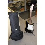 A STARCASTER GUITAR AND STAND