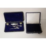 A CASED VINTAGE SILVER MANICURE SET AND A RING HOLDER / CASE