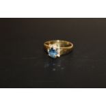 A SAPPHIRE AND DIAMOND RING, set in unmarked yellow metal, approx weight 4.6 g, ring size S