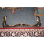 AN ART NOUVEAU CAST IRON AND COPPER FIRE FENDER, having various floral and organic embellishment,