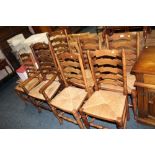 A SET OF EIGHT OAK WICKERSEAT LANCASHIRE STYLE CHAIRS ( 2 CARVERS )