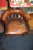 AN ANTIQUE OAK AND LEATHER CAPTAINS TUB ARMCHAIR A/F