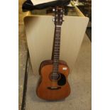 AN ENCORE ACOUSTIC GUITAR