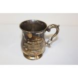 A HALLMARKED SILVER TANKARD WITH PRESENTATION INSCRIPTION