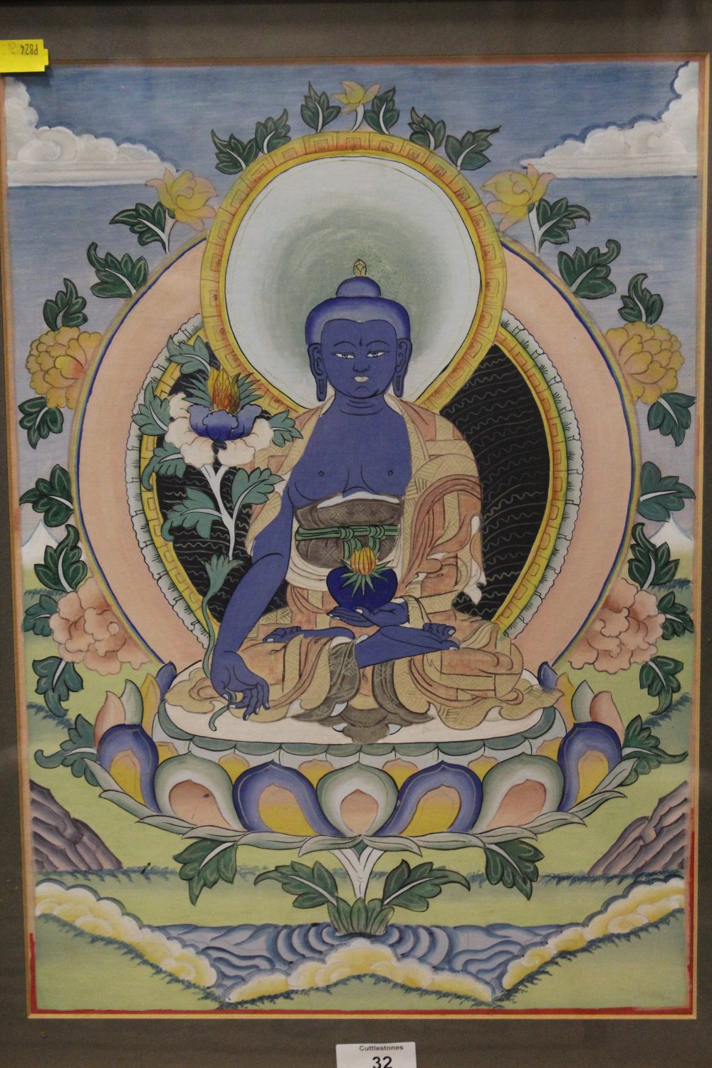 A FRAMED AND GLAZED OIL PAINTING OF A DEITY, OVERALL HEIGHT 58 CM