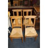 A SET OF FOUR WICKER SEAT SCHOOL STYLE CHAIRS