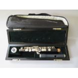 A PEARL PICCOLO PFP-105, with hard case and carry bag