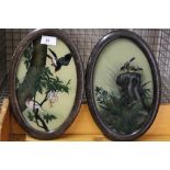 A PAIR OF JAPANESE REVERSE PAINTED PICTURES IN OVAL FRAMES