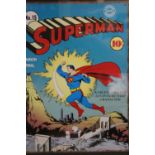 A FRAMED AND GLAZED REPRODUCTION ENAMEL PLAQUE OF A SUPERMAN COMIC COVER, OVERALL HEIGHT 58 CM