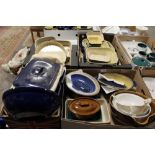 FOUR TRAYS OF MAINLY DENBY BLUE STONEWARE TO INCLUDE LIDDED VEG DISHES, FLAN DISHES, BOWLS ETC