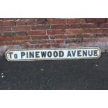 A VINTAGE CAST METAL STREET SIGN ' TO PINEWOOD AVENUE ' W 147 CM