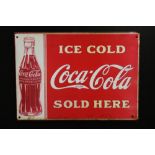 A FRAMED REPRODUCTION ENAMEL COCA-COLA PLAQUE, OVERALL HEIGHT 58 CM