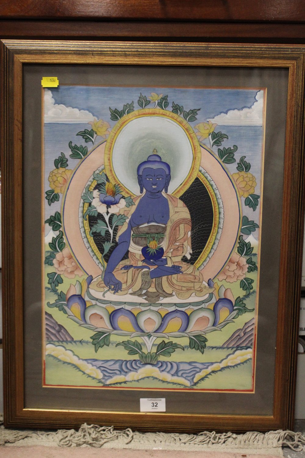 A FRAMED AND GLAZED OIL PAINTING OF A DEITY, OVERALL HEIGHT 58 CM - Image 2 of 2