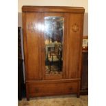 AN OAK VINTAGE MIRRORED WARDROBE