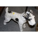 A LARGE CHALK FIGURE OF A TERRIER DOG, H 37 CM L 43 CM