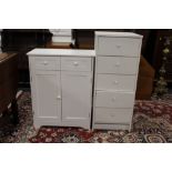 A MODERN WHITE SLIM CHEST WITH ANOTHER MODERN WHITE CUPBOARD (2)