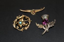 A 9 CARAT GOLD STAR OF TURKEY BROOCH TOGETHER WITH A SILVER SCOTTISH EXAMPLE AND A TURQUOISE EXAMPLE