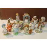 A COLLECTION OF BESWICK AND ROYAL ALBERT BEATRIX POTTER FIGURES (12)