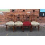 A SET OF FOUR 19TH CENTURY UPHOLSTERED DINING CHAIRS WITH CARVED DETAIL