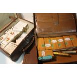 TWO BRIEF CASES CONTAINING CIGARETTE CARDS IN CIGARETTE BOXES