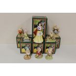 EIGHT BOXED ROYAL DOULTON SNOW WHITE AND THE SEVEN DWARVES FIGURES - SNOW WHITE (SW9), DOC (SW10),