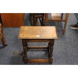 A RUSTIC OAK JOINT STYLE STOOL H-47 W-48 CM