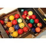 A BOX OF VINTAGE POOL BALLS