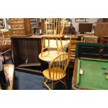 A SMALL PINE PEDESTAL TABLE WITH TWO MODERN CHAIRS