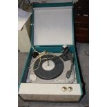 A RETRO MONARCH PORTABLE RECORD PLAYER