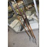 THREE VINTAGE HICKORY SHAFT GOLF CLUBS, three putters comprising a Standard Gold Co. 'The New Mills'