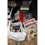A SUITCASE OF ASSORTED BOOKS TO INCLUDE WWII INTEREST TOGETHER WITH A BAG OF CD'S