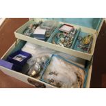 A BOX OF ASSORTED JEWELLERY TO INCLUDE A SILVER LOCKET, GEM SET DRESS RINGS, YELLOW METAL BANGLES
