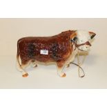 A BUTCHER SHOP STYLE LARGE CERAMIC FIGURE OF A HEREFORD BULL, L 43 CM