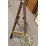 A VINTAGE WOODEN ARTISTS EASEL AND PALETTE (2)