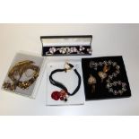 A SMALL COLLECTION OF DESIGNER COSTUME JEWELLERY ITEMS, to include an earrings and necklace set by