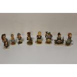 A COLLECTION OF EIGHT SMALL GOEBEL FIGURES