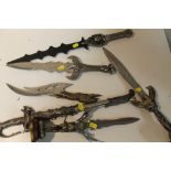 A COLLECTION OF MODERN DECORATIVE DAGGERS ETC. (6)
