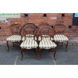 A SET OF SIX 19TH CENTURY ROSEWOOD DINING CHAIRS, raised on cabriole supports