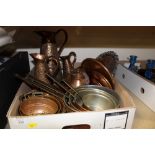 A TRAY OF COPPER TO INCLUDE A SET OF THREE GRADUATING CROCODILE SKIN EFFECT JUGS