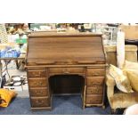 AN ANTIQUE OAK TWIN PEDESTAL 'S' TAMBOUR ROLL-TOP DESK OF SMALL PROPORTIONS W-202 CM